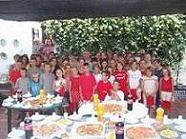 Pedro Álvarez asiste a una fiesta de bienvenida a los niños bielorrusos que veranean en Motril en la residencia Virgen de la Cabeza